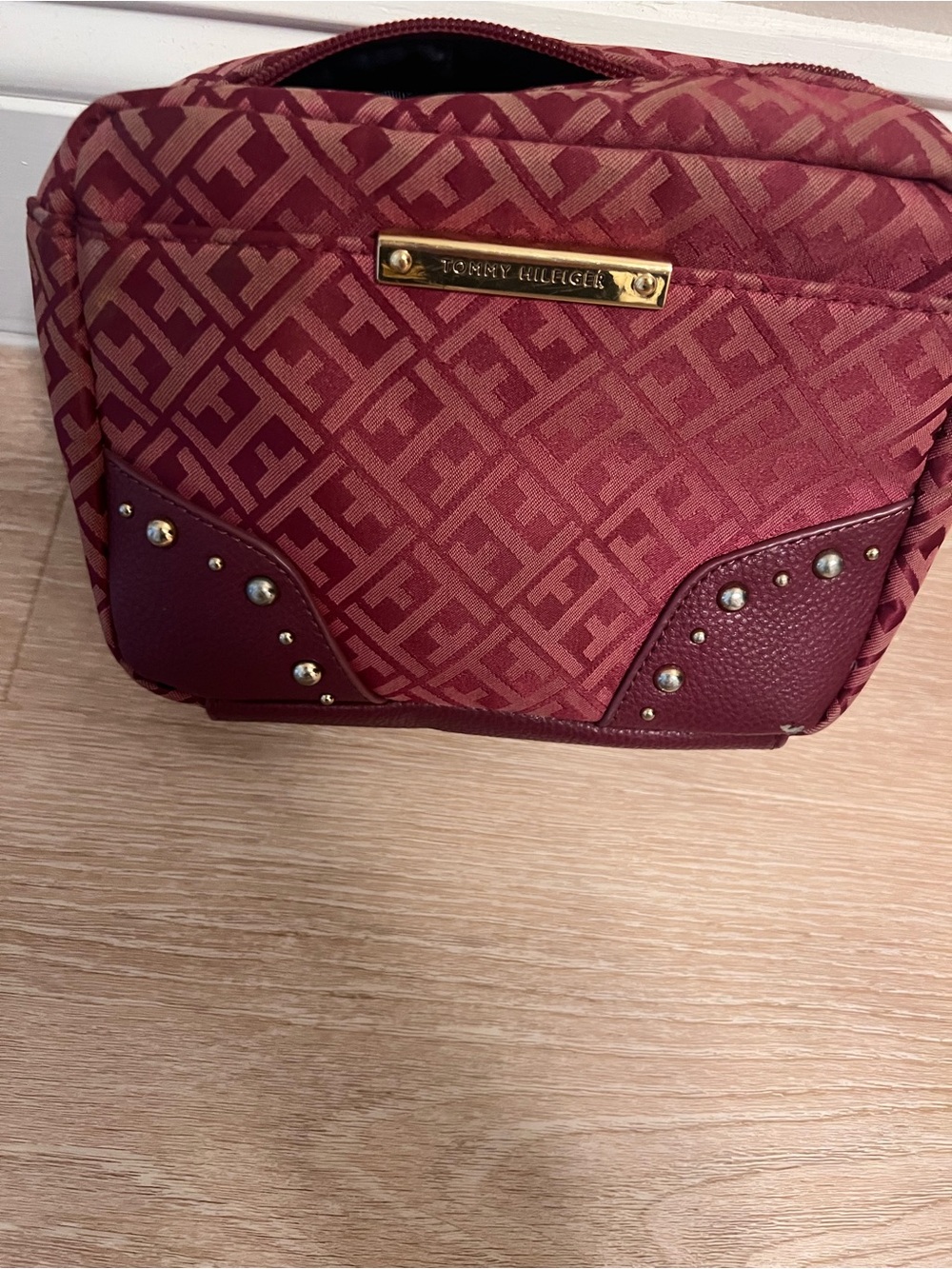 Tommy Hilfiger Burgundy Monogram Camera bag with Gold Plate